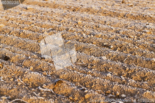 Image of plowed land, frost