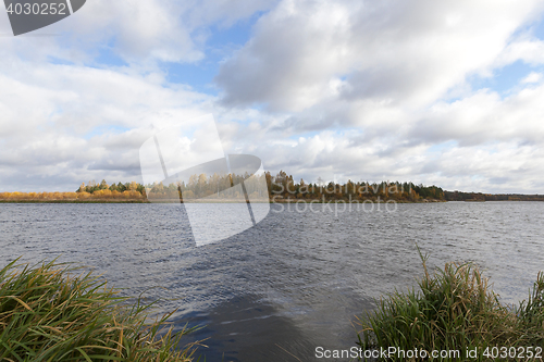 Image of the river and the forest, autumn