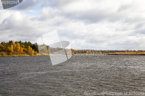 Image of the river and the forest, autumn