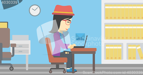 Image of Business woman receiving or sending email.
