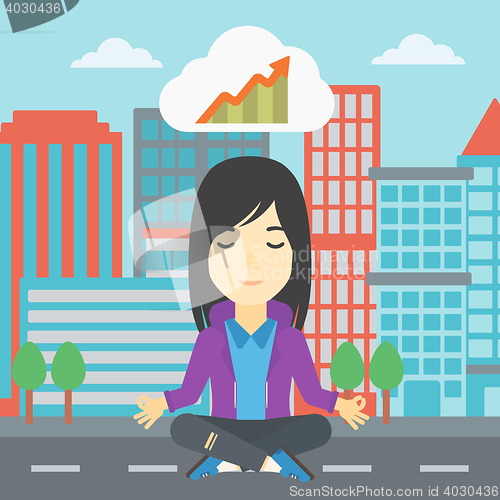 Image of Peaceful business woman doing yoga.