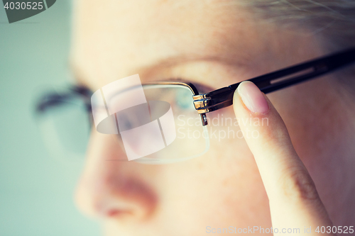 Image of close up of woman in eyeglasses