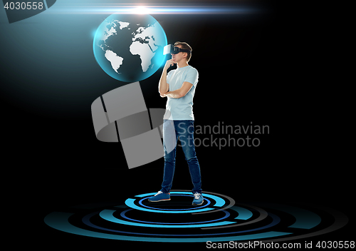 Image of happy man in virtual reality headset or 3d glasses