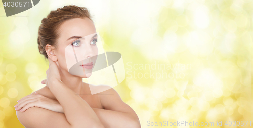 Image of beautiful young woman face and hands