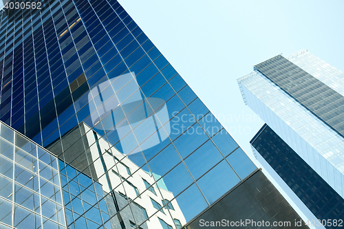 Image of close up of office building or skyscraper and sky