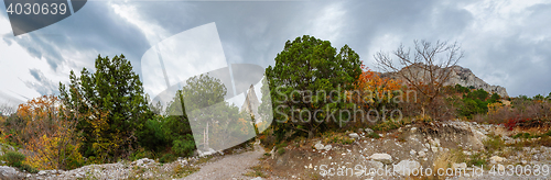 Image of mountain cliff on a cloudy autumn day