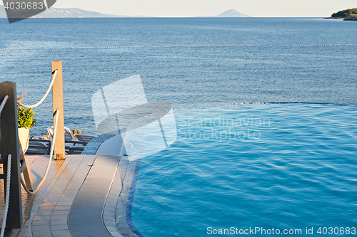 Image of Infinity pool on the sunset