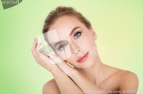 Image of beautiful young woman face and hands