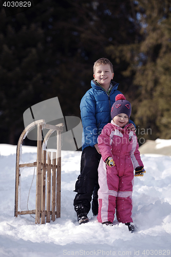 Image of Brother and sister portrait in winter time