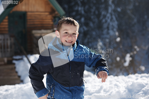 Image of kids playing with  fresh snow