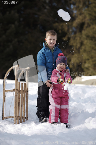 Image of Brother and sister portrait in winter time