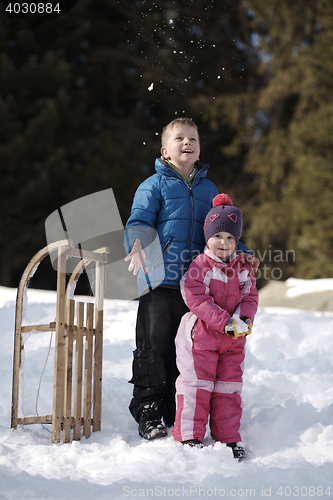 Image of Brother and sister portrait in winter time