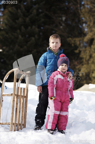 Image of Brother and sister portrait in winter time