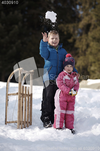 Image of Brother and sister portrait in winter time