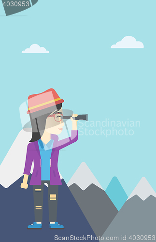 Image of Business woman looking through spyglass.