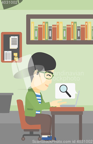Image of Businessman working on his laptop.