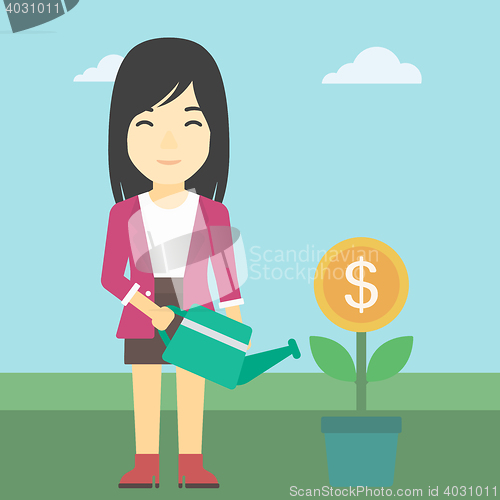 Image of Business woman watering money flower.