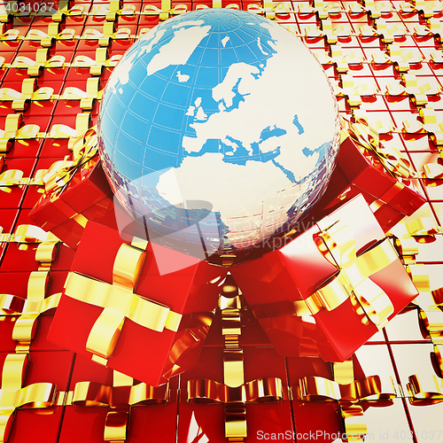 Image of Traditional Christmas gifts and earth. Global holiday concept . 