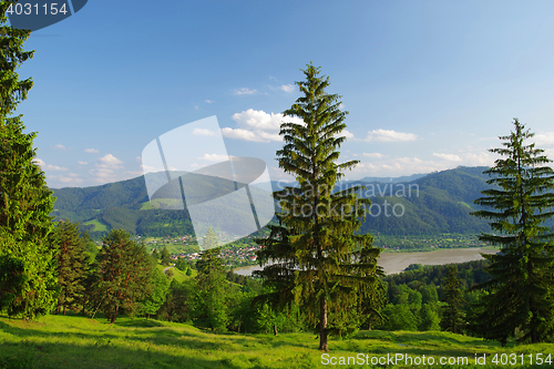 Image of Houses on river valley