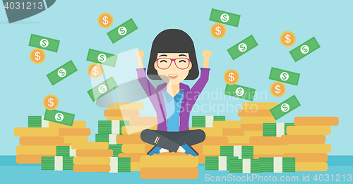 Image of Happy business woman sitting on coins.