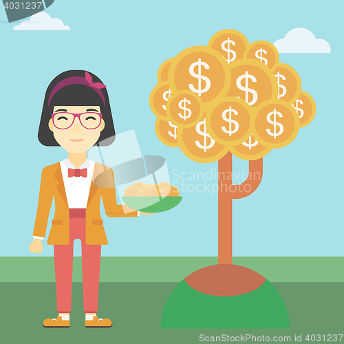 Image of Business woman catching dollar coins.