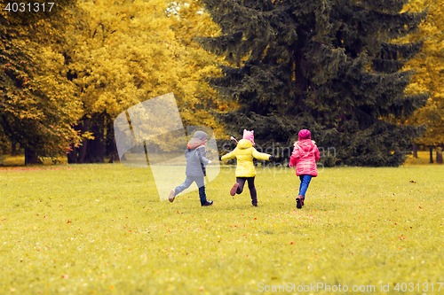 Image of group of happy little kids running outdoors