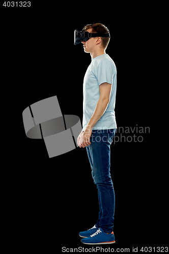 Image of happy man in virtual reality headset or 3d glasses