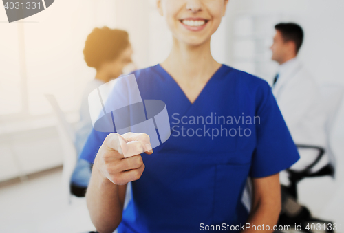 Image of close up of nurse pointing on you at hospital