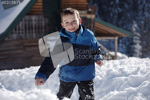 Image of kids playing with  fresh snow