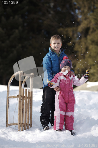 Image of Brother and sister portrait in winter time