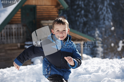 Image of kids playing with  fresh snow