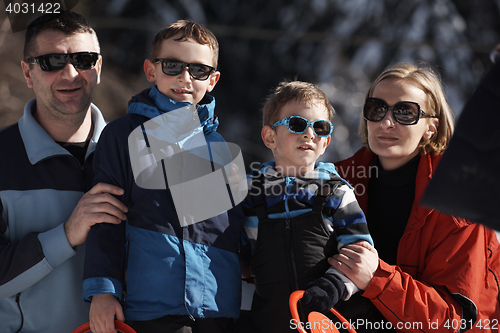 Image of family portrait at beautiful winter day