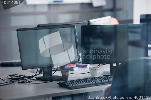 Image of empty office with modern computers