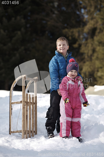 Image of Brother and sister portrait in winter time