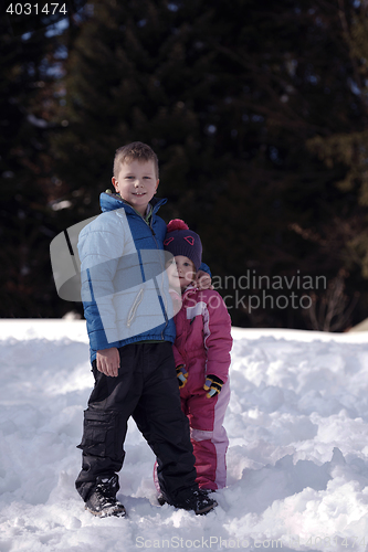 Image of Brother and sister portrait in winter time