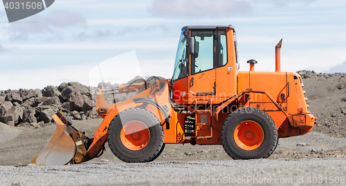 Image of Large orange bulldozer