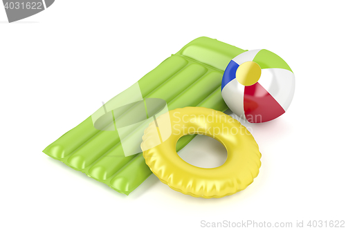Image of Beach ball, mattress and swim ring