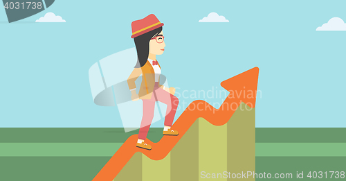 Image of Business woman running along the growth graph.