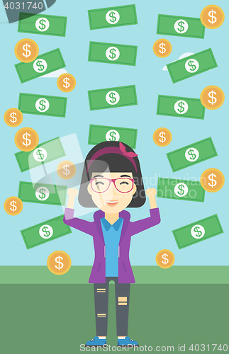 Image of Happy businessman under money rain.