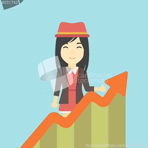 Image of Business woman with growing chart.