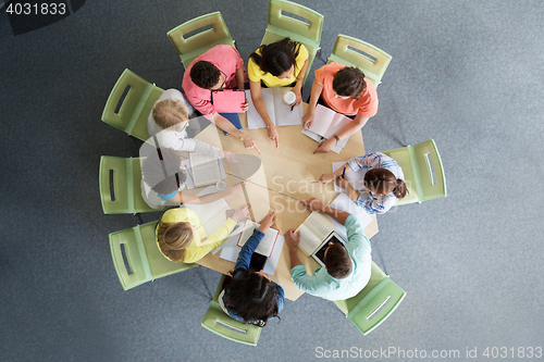 Image of group of international students pointing finger