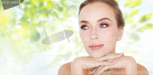 Image of beautiful young woman face and hands