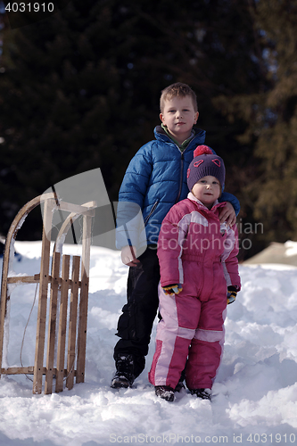 Image of Brother and sister portrait in winter time