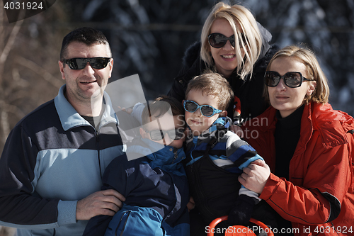 Image of family portrait at beautiful winter day