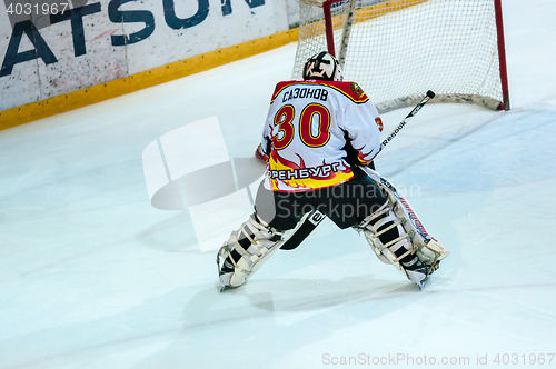 Image of A fragment of the hockey penalty shot performed by the young hockey player 