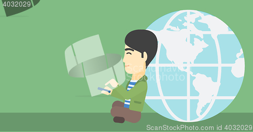 Image of Businessman sitting near Earth globe.