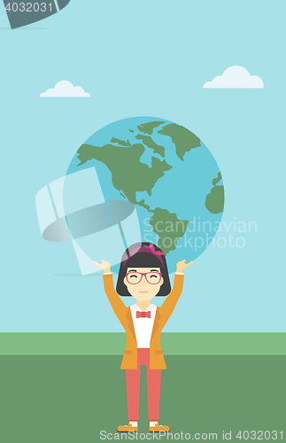 Image of Business woman holding Earth globe.