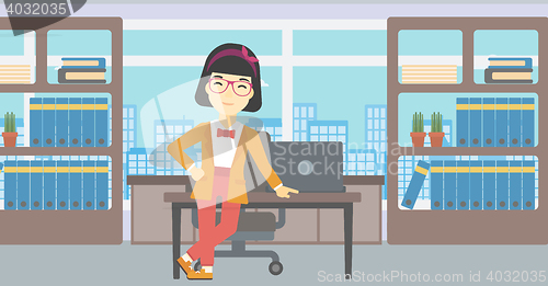 Image of Business woman standing in the office.