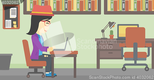 Image of Business woman working on her laptop.