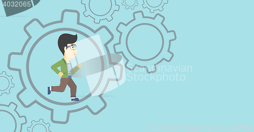 Image of Businessman running inside the gear.